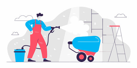 construction worker using concrete sprayer on wall