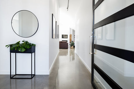 Polished concrete decor in a modern hallway.