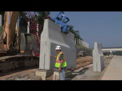 KL 9000 | Video of Kenco Lifter Moving 8 Foot High Wall